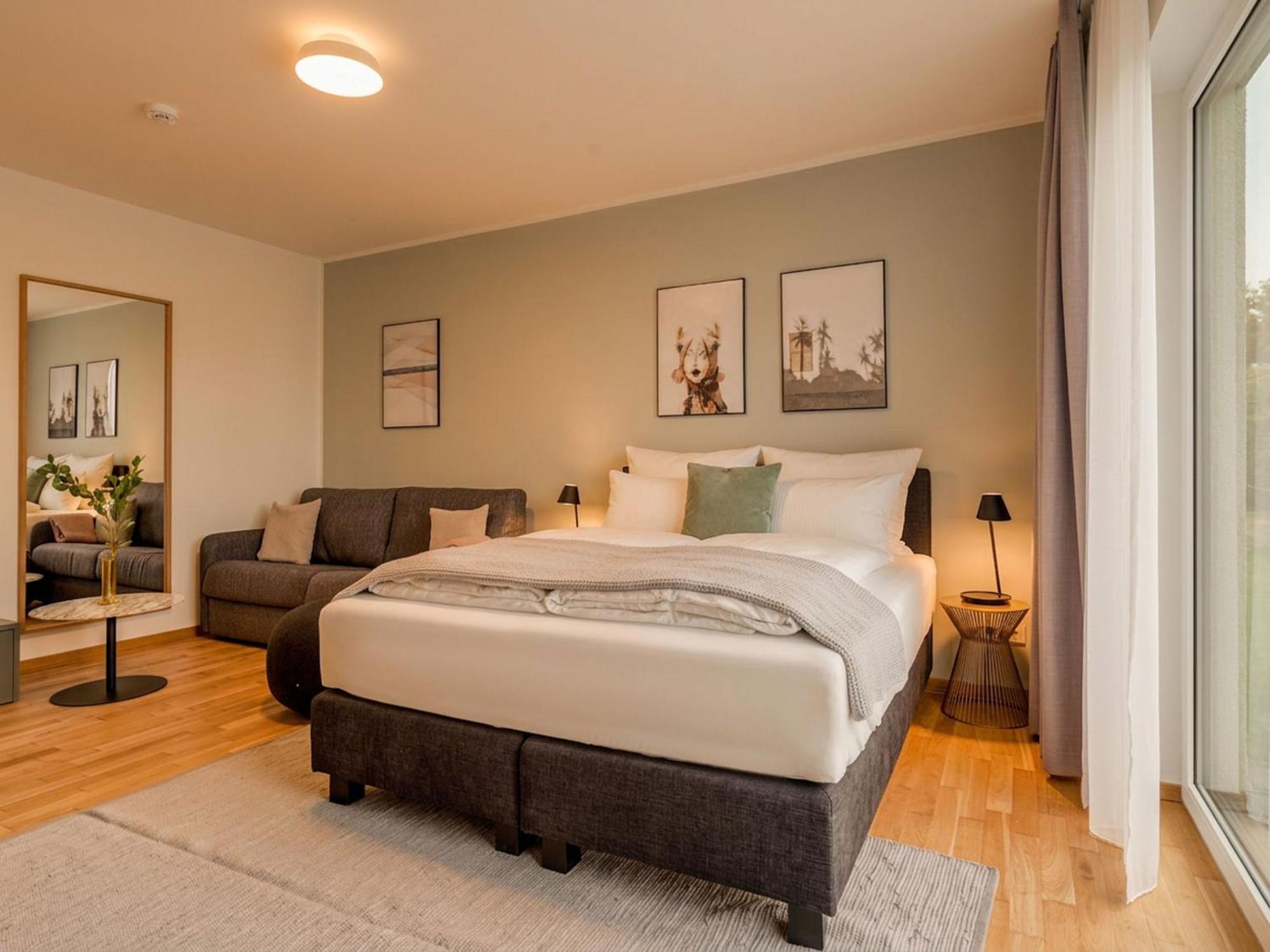 Suite L mit Balkon und Blick auf den Innenhof